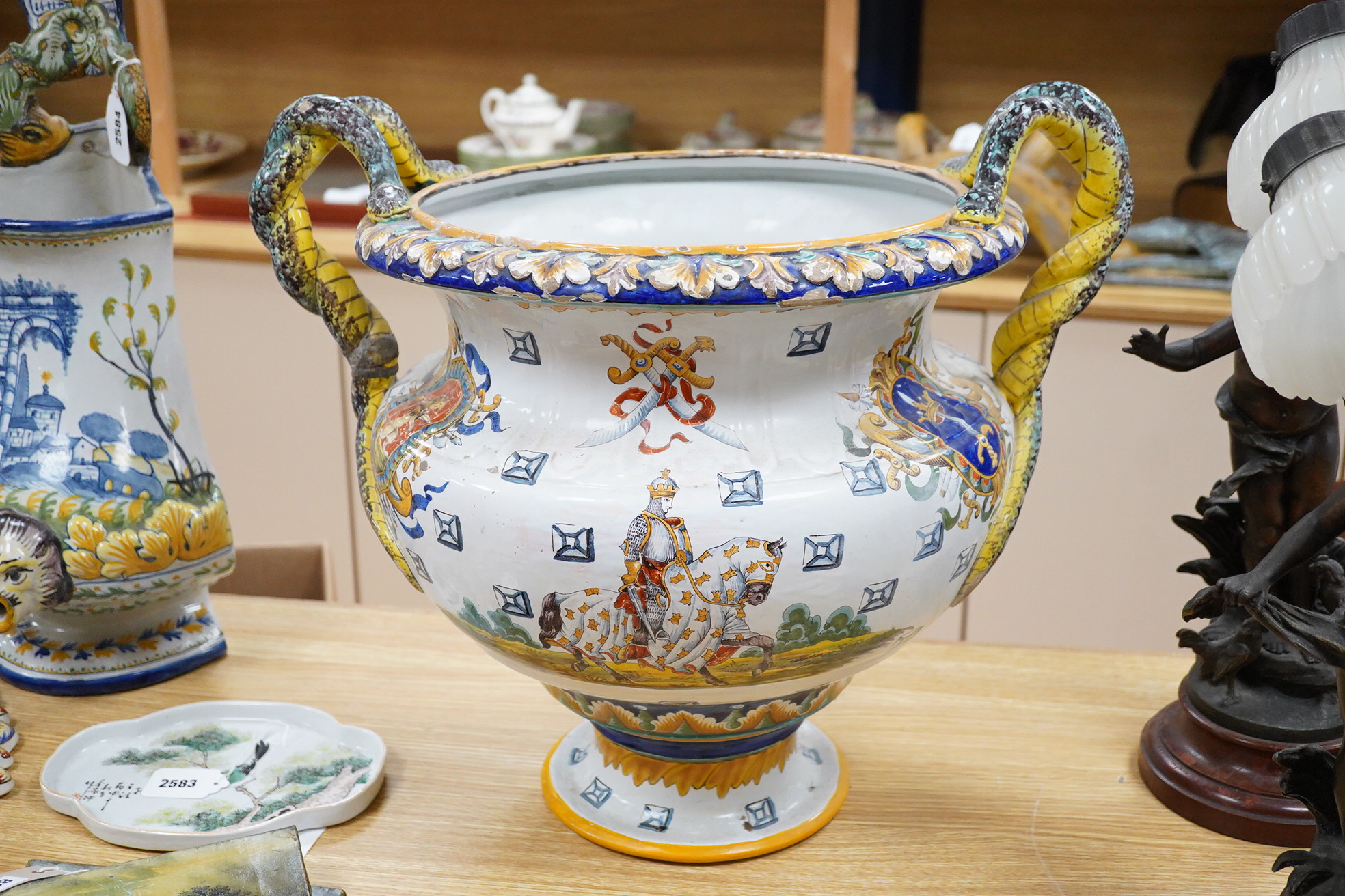 A large French faience twin snake handled pedestal planter, 47cm high